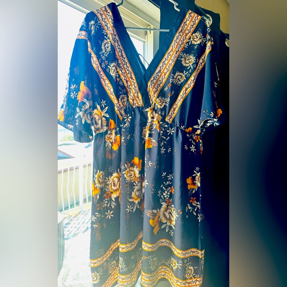 Women’s summer dress or bathing suit cover up light weight material ,